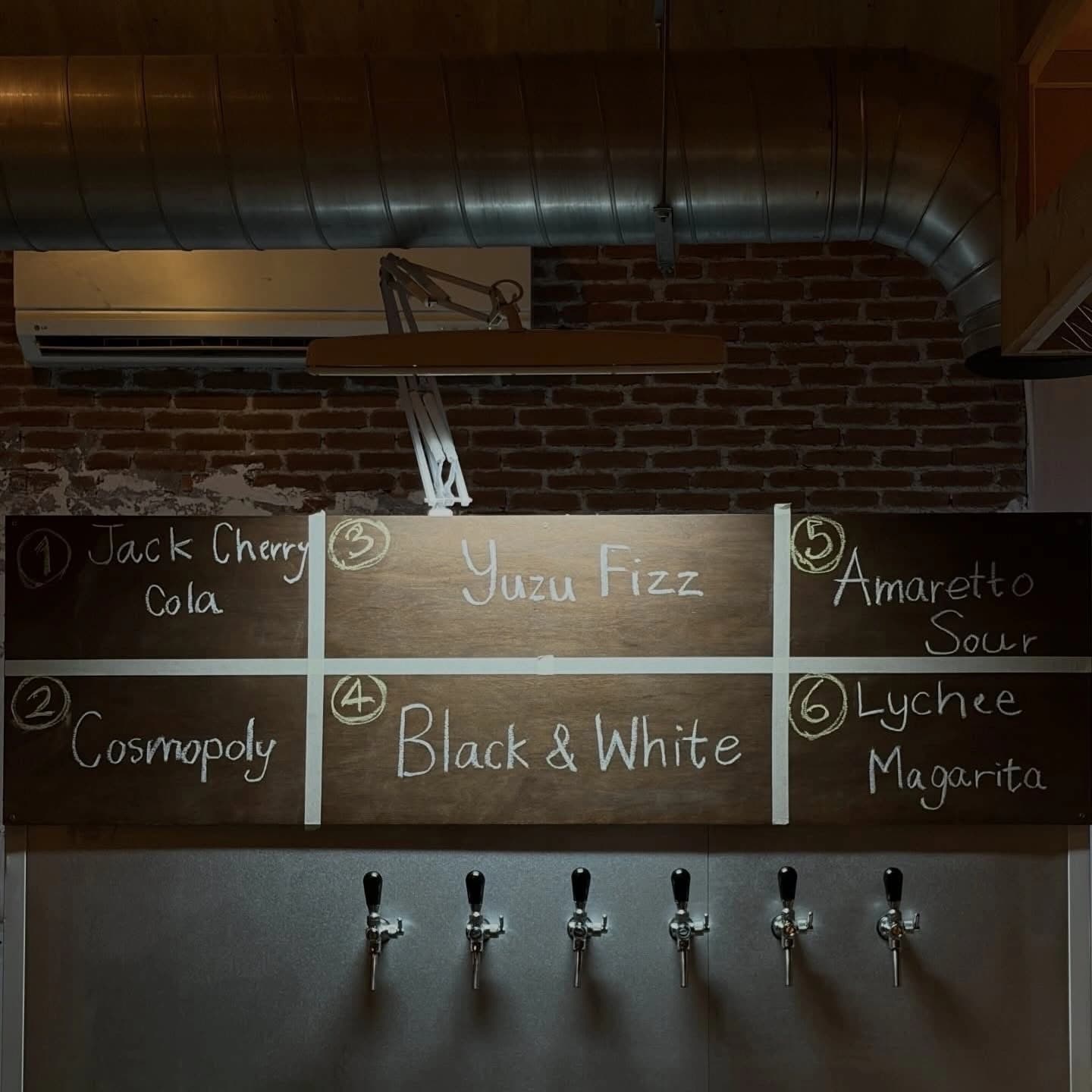 Craft cocktail served at the mahogany bar
